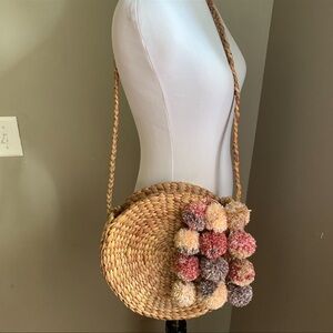 Brunna - Round Straw Cross Body Bag with Pom Poms